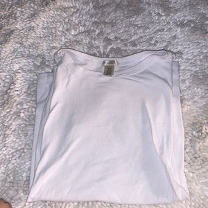 Plain white M sized T shirt . Too small to wear